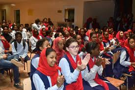 Pupils applauding at assembly
